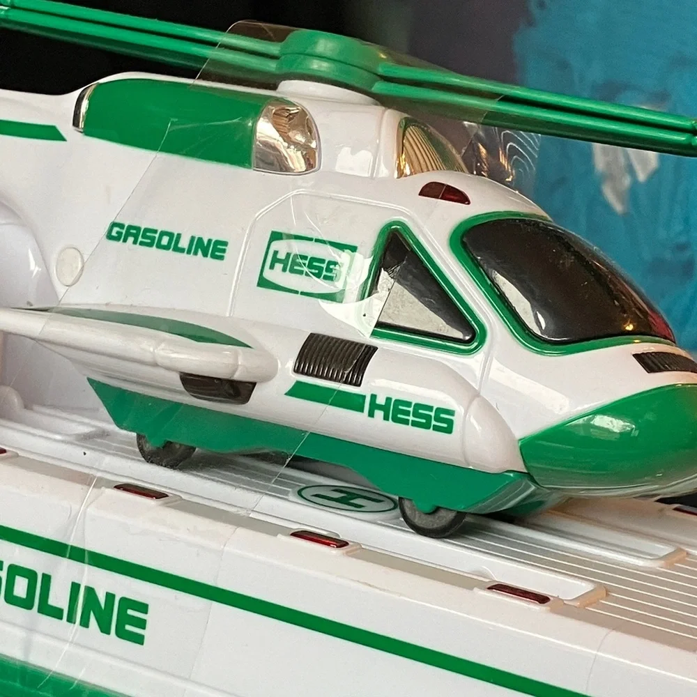 HESS Gasoline Semi Truck carrying helicopter Toy 2010 Toy plays sounds